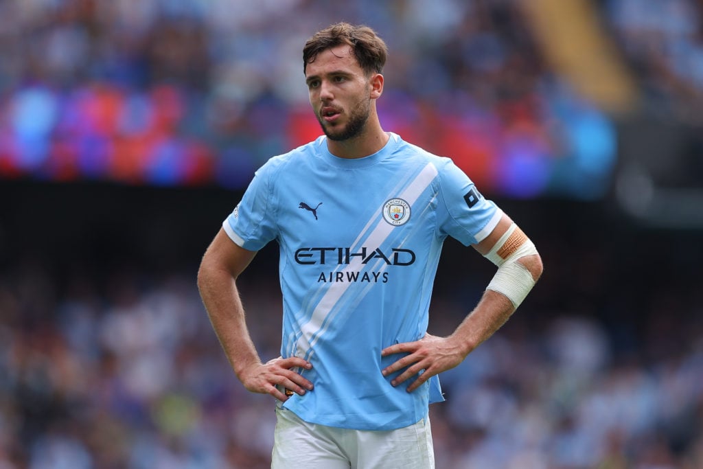 Nico Gonzalez with his hands on his hips during Manchester City v Tottenham Hotspur.