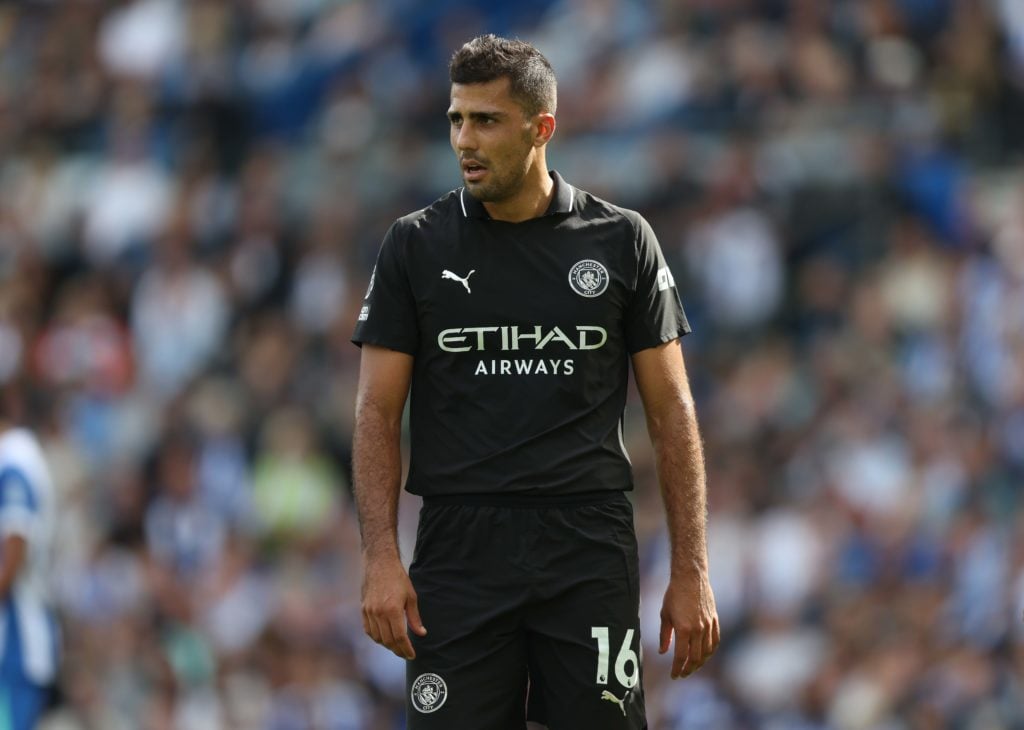 Rodri in action during Brighton & Hove Albion v Manchester City.
