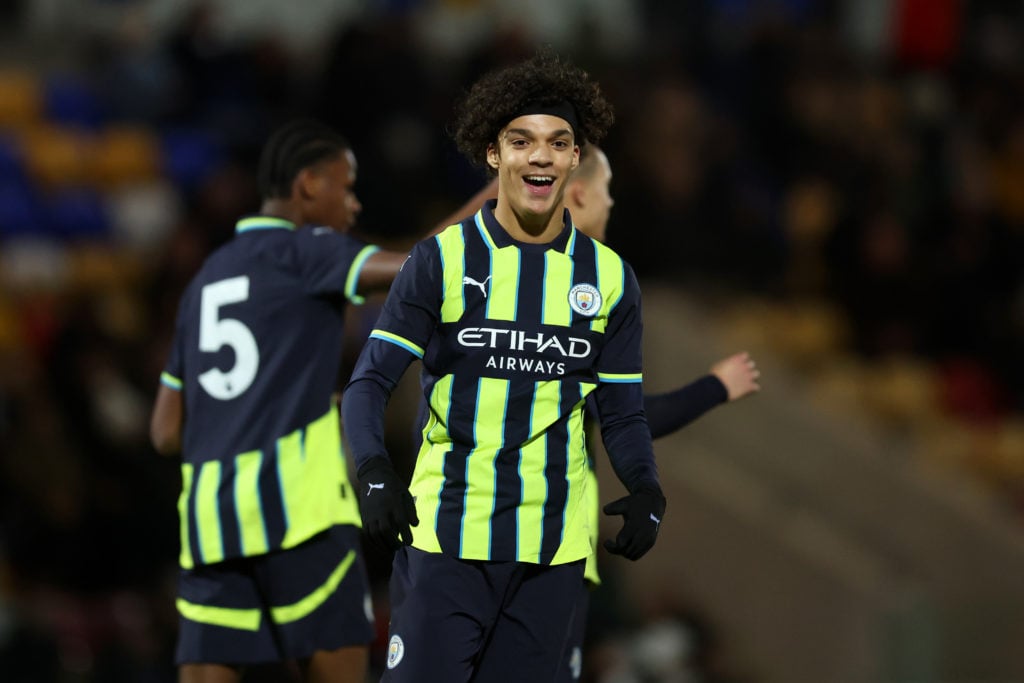Luca Fletcher in action for Manchester City.