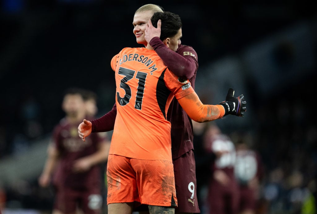 Ederson and Erling Haaland hugging.