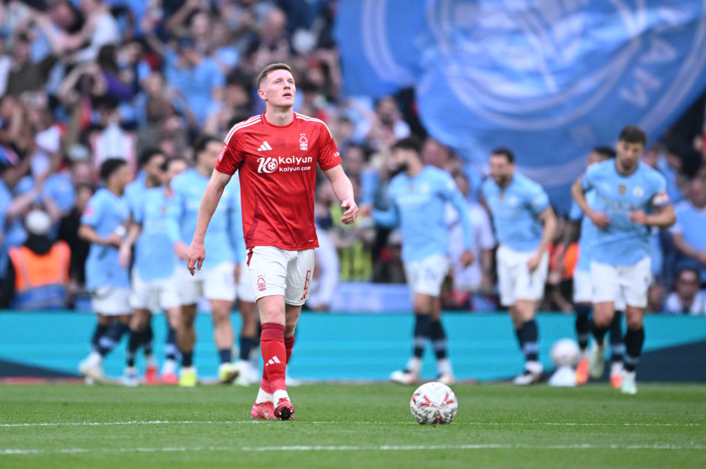 Elliot Anderson of Nottingham Forest reacts after Josko Gvardiol of Manchester City (obscured) scored their sides second goal during the Emirates FA Cup Semi Final match between Nottingham Forest and Manchester City at Wembley Stadium on April 27, 2025 in London, England.