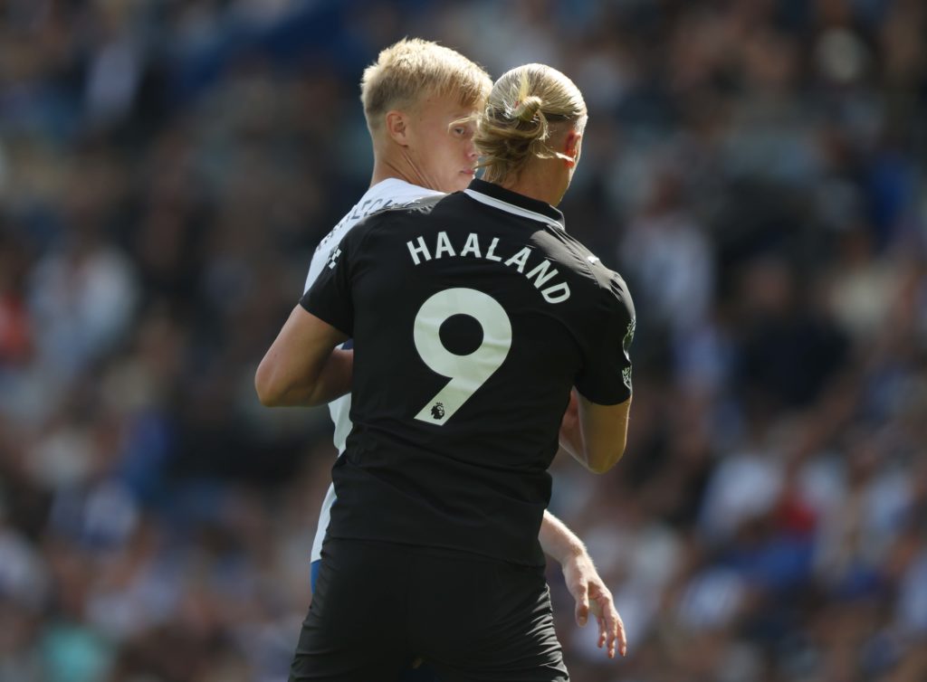 Erling Haaland and Jan Paul van Hecke during Brighton v Manchester City.
