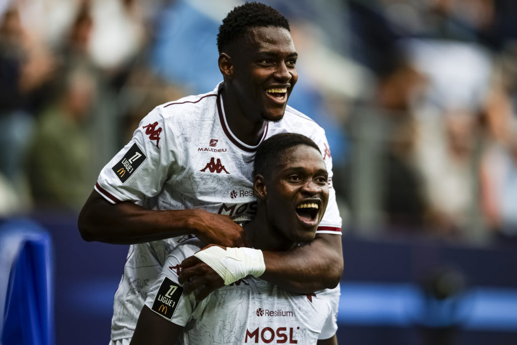 Sadibou Sane of FC Metz (R) celebrating his goal with his teammate Idrissa Gueye of FC Metz (L) during the Ligue 1 McDonald's match between Paris FC and FC Metz at Stade Jean Bouin on August 31, 2025 in Paris, France.