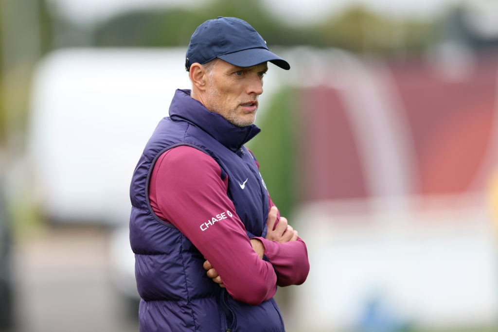 Thomas Tuchel with his arms crossed during England training.