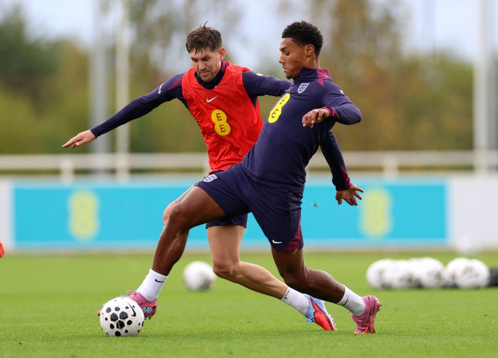 Ollie Watkins and John Stones of England during a training session at St George's Park on September 03, 2025 in Burton upon Trent, England.