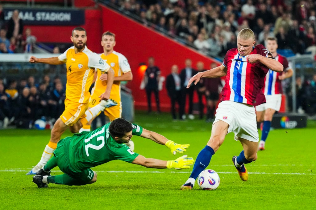 Norway's forward #09 Erling Braut Haland (R) kicks to score the 4-0 goal during the 2026 World Cup qualifiers Europe zone group I football match between Norway and Moldova on September 9, 2025 in Oslo, Norway.