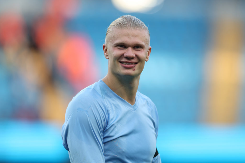 Erling Haaland smiles during Manchester City v Manchester United.