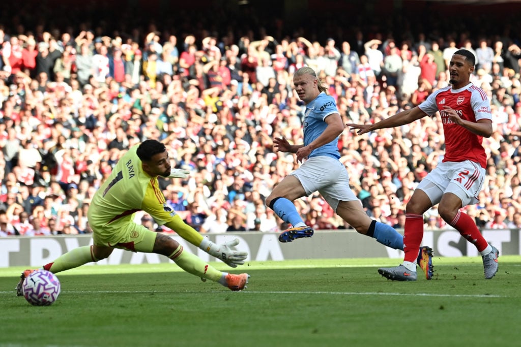 Erling Haaland, David Raya and William Saliba looks on before his goal for Arsenal vs Manchester City