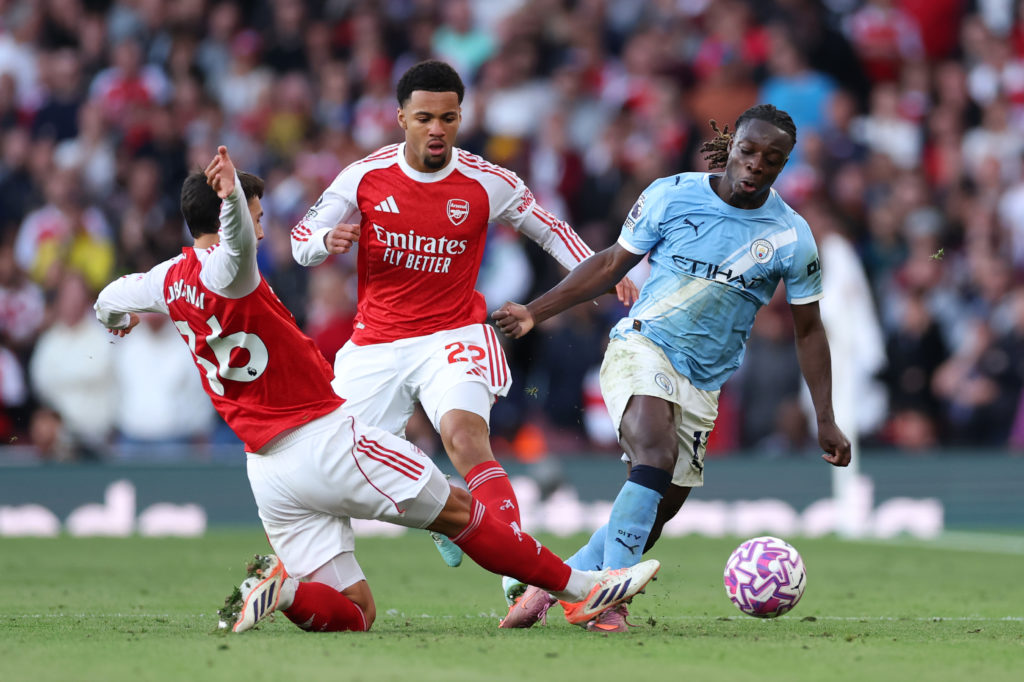 Jeremy Doku, Ethan Nwaneri and Martin Zubimendi in action during Arsenal v Manchester City