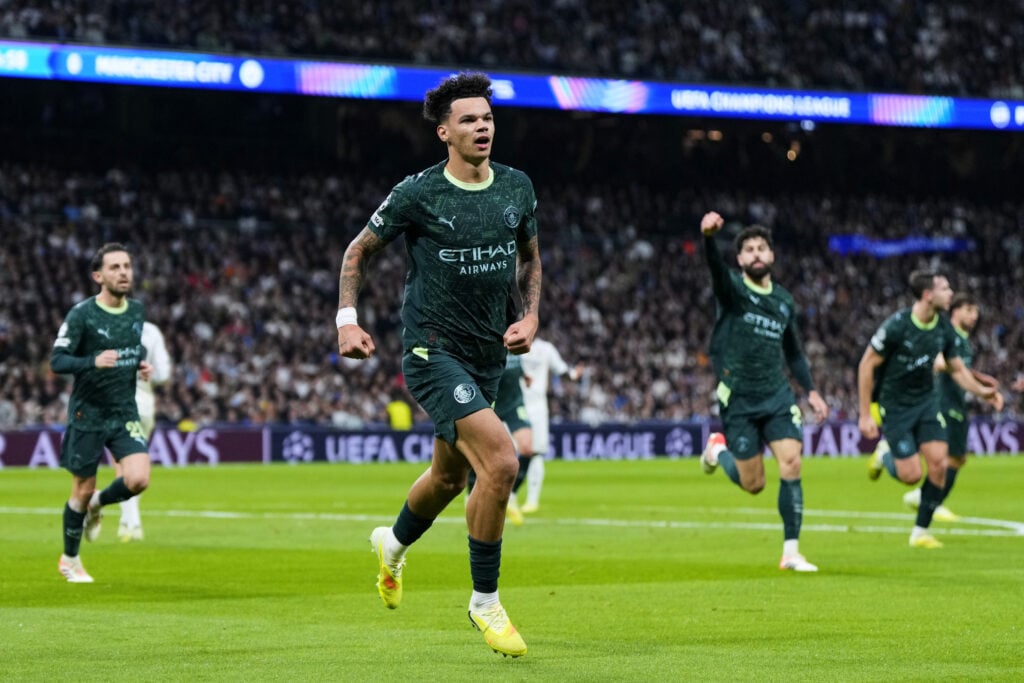 Nico O'Reilly celebrates after scoring for Manchester City.