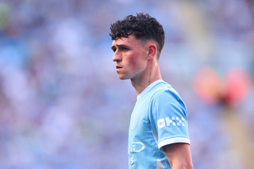 Phil Foden playing for Manchester City.