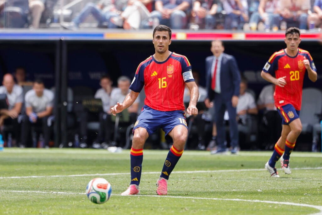 Rodri plays a pass for Spain.